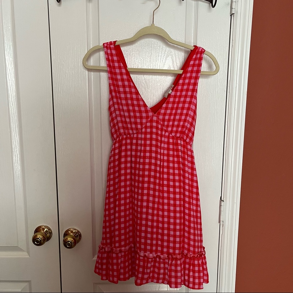 Pink & red gingham pattern, comes with matching belt, cute ruffles